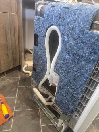 Dishwasher door mechanism repair by Calgary appliance technician