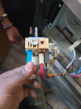 Dryer igniter and switch component repair by Calgary appliance technician